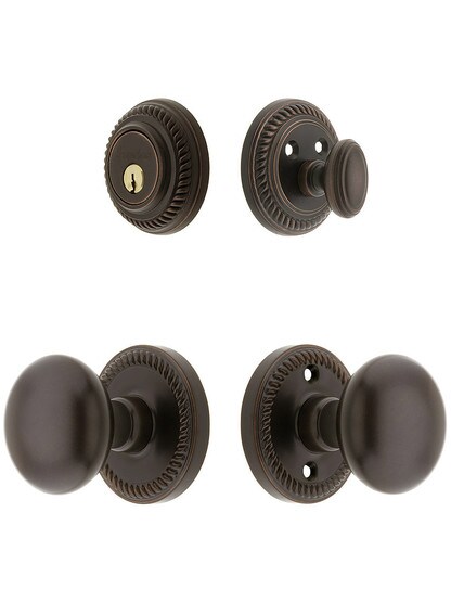 Grandeur Newport Entry Door Set, Keyed Alike with Round Brass Knobs in Oil-Rubbed Bronze.